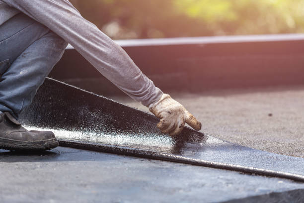 Professional Waterproofing technician working in Huron, OH